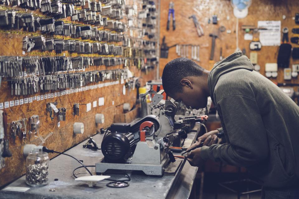 A craftsman working at a workbench